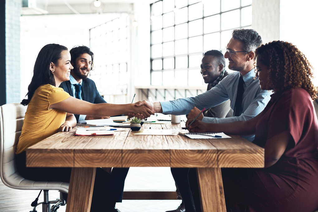 Buyer and owner reviewing information during business due diligence